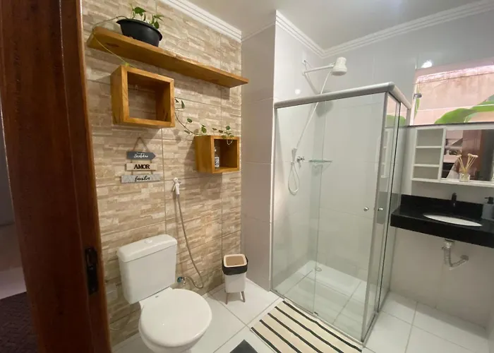APARTAMENTO COM SUITE EM CONDOMÍNIO FECHADO com estacionamento próprio Porto Seguro
